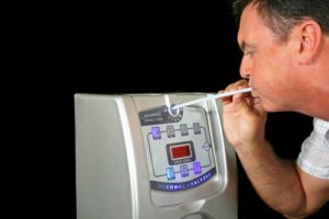 man-taking-breath-test